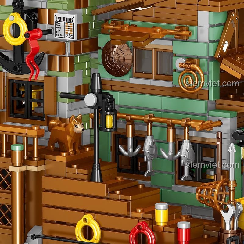 Mặt sau của bộ lắp ráp Mô hình làng chài ZHEGAO, cho thấy thiết kế kiến trúc độc đáo và các nhân vật.