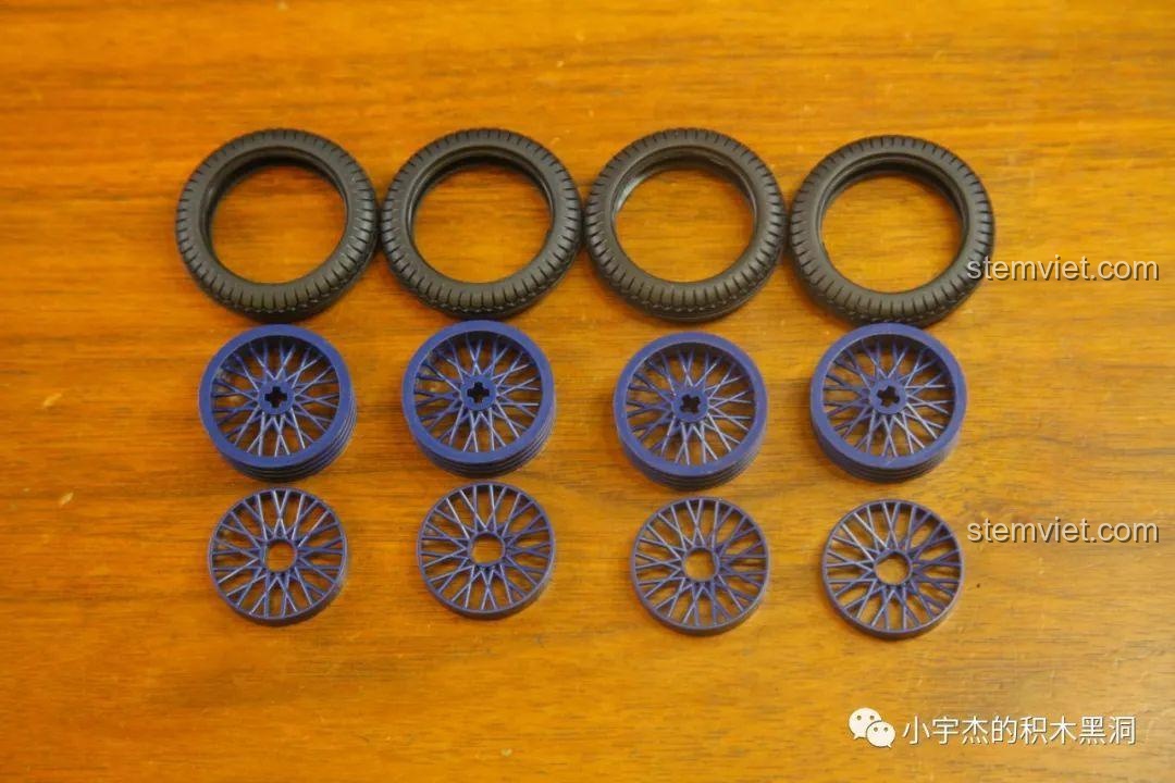 Cận cảnh các bánh xe và vành nan hoa màu xanh của bộ đồ chơi mô hình Xe Duryea Runabout L 5400.