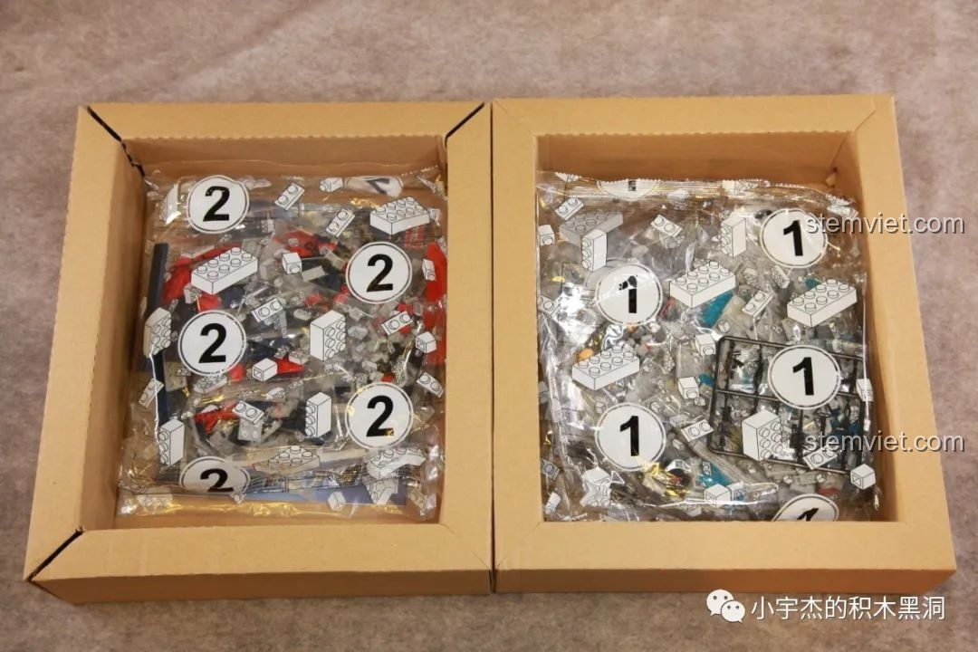 Bên trong hộp lớn WOMA C0897 là hai hộp carton nhỏ chứa các túi mảnh ghép được đánh số thứ tự 1 và 2.