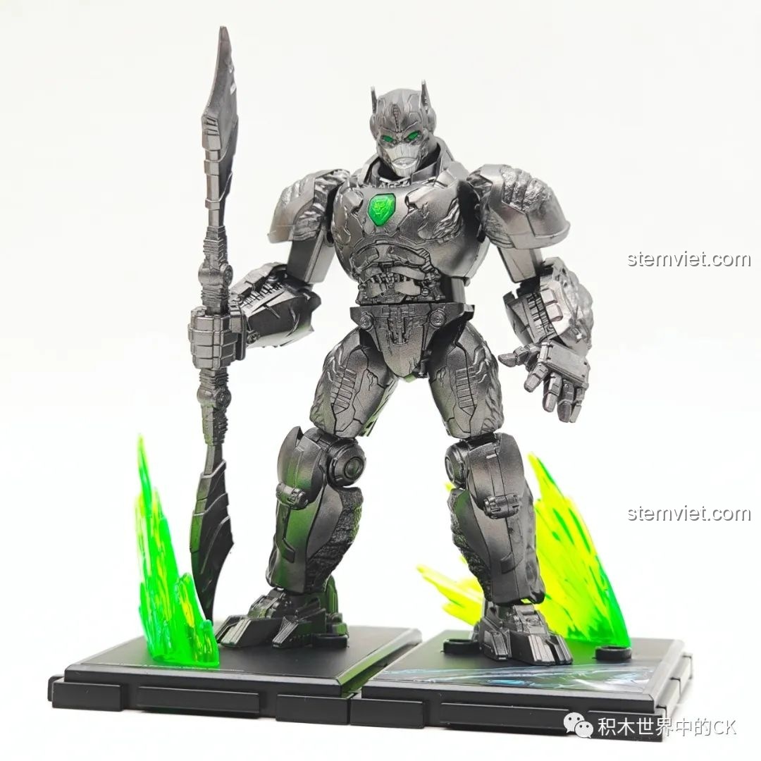 Mô hình BLOKEES 71145 Optimus Primal Đội Trưởng Tinh Tinh trưng bày với hiệu ứng năng lượng xanh, tạo cảnh quan sống động.