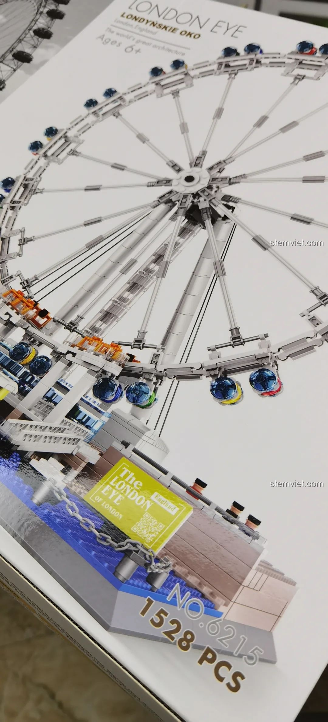 Góc cận cảnh thông tin sản phẩm trên hộp bộ lắp ghép London Eye WANGE 6215, bao gồm số mảnh ghép và mã sản phẩm.