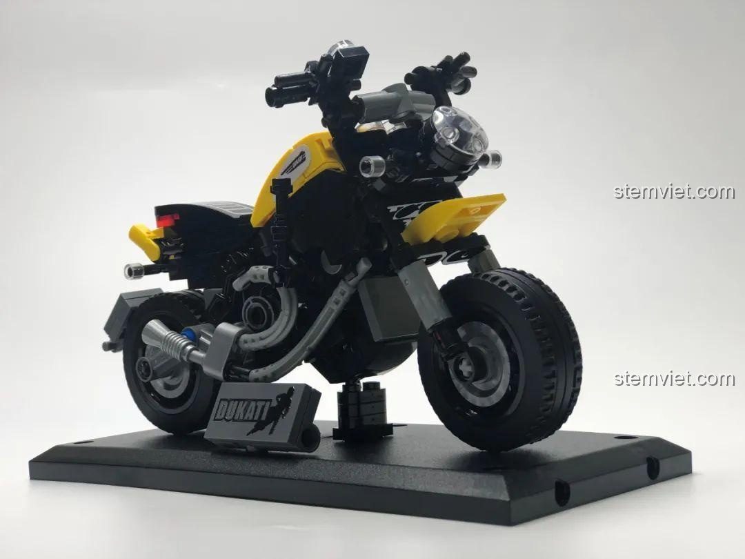 Mô hình xe mô tô Ducati Scrambler Sembo 701105 nhìn từ phía trước, nổi bật với màu vàng và đen.