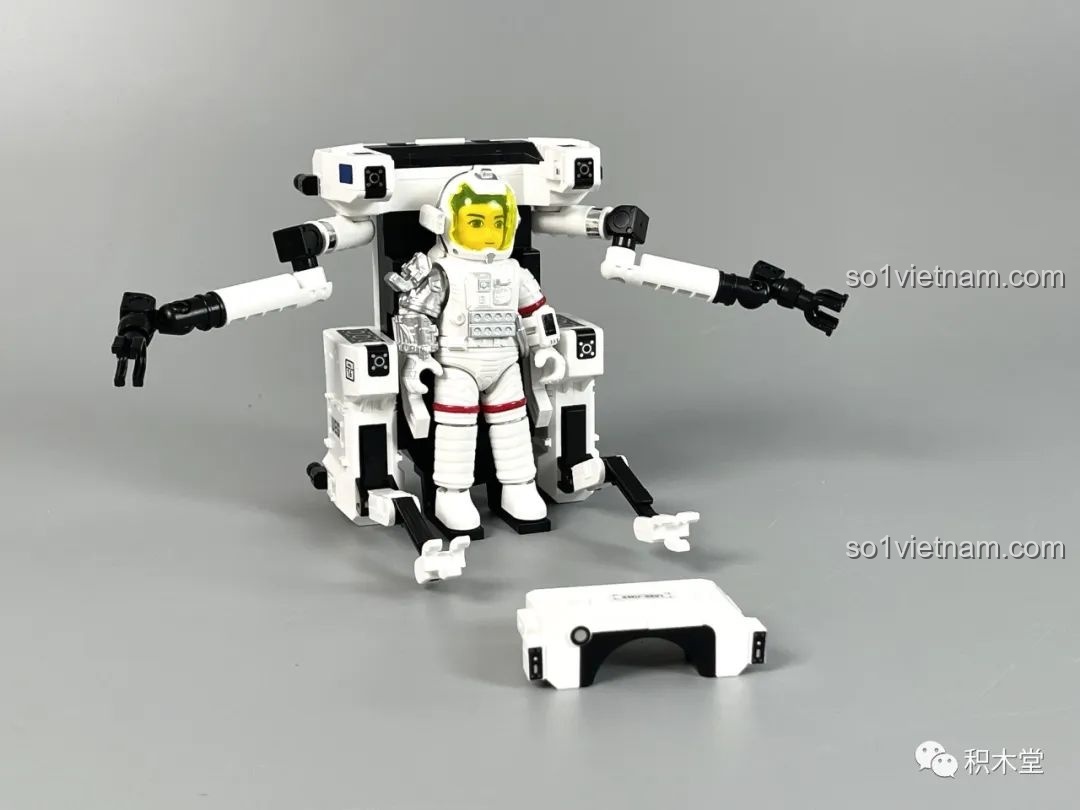 Mô hình MMU với cánh tay robot và phi hành gia đang ngồi, cánh tay chụp từ bộ布鲁可 Lưu Lạc Địa Cầu 2