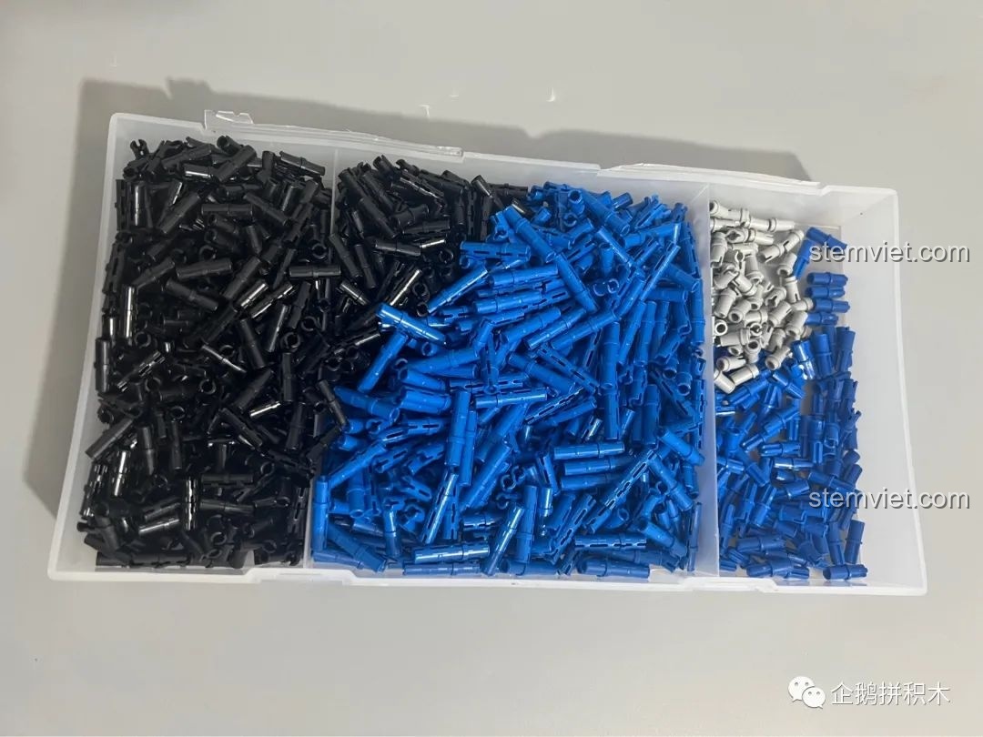 Hộp đựng các chốt kết nối màu đen, xanh và trắng của bộ lắp ráp Moyu Block MY88008 Bugatti Bolide.