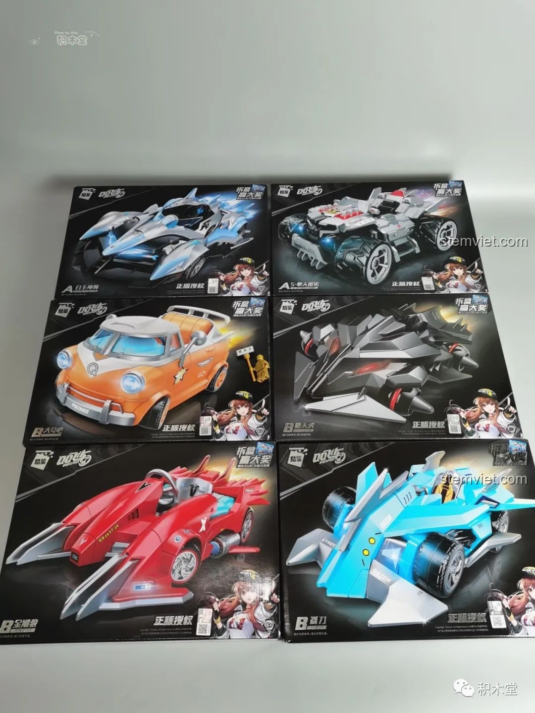 Tổng quan 6 hộp đồ chơi lắp ráp xe đua QQ Phi Xa Enlighten, mỗi hộp một mẫu xe độc đáo.