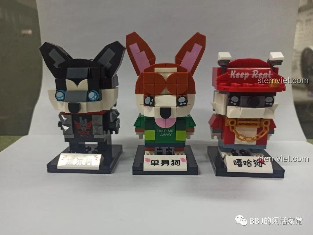 Bộ sưu tập các mô hình chó GUDI Cute Footion, trong đó có Chú Chó Rocker 53002.