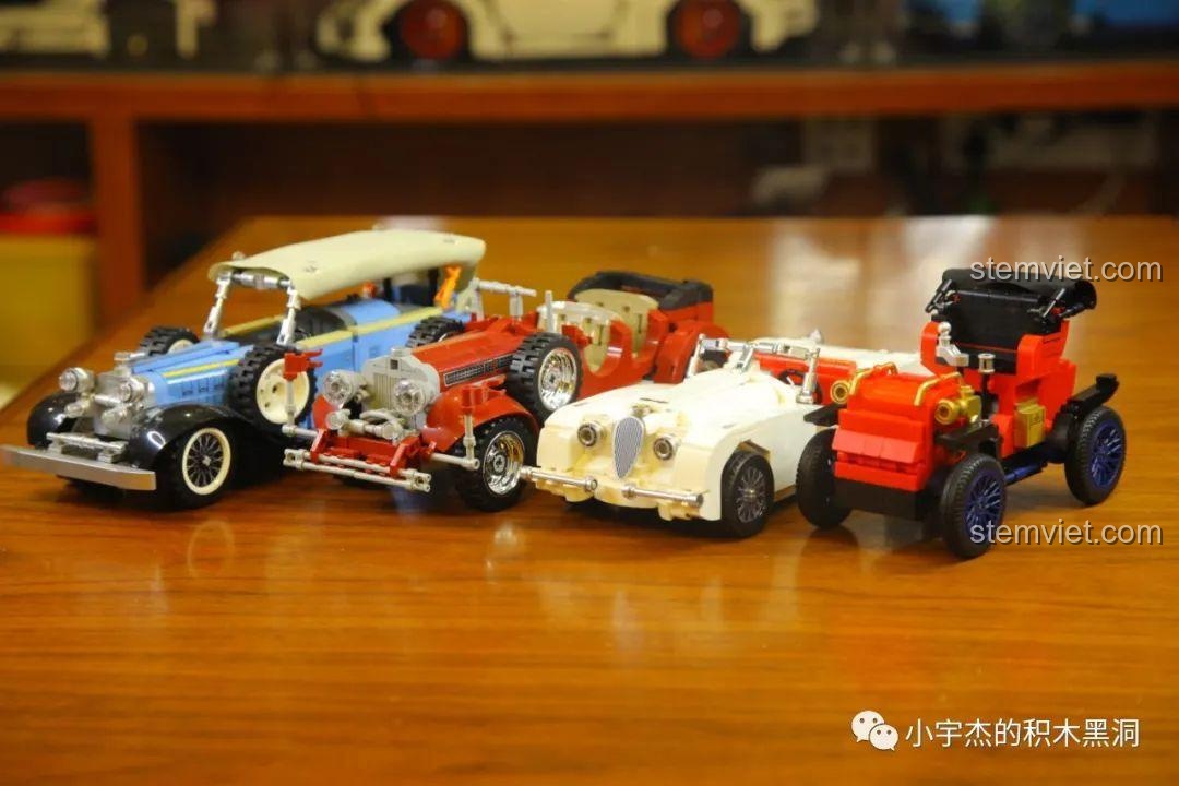 Mô hình xe Duryea Model L SEMBO 705400 được đặt cạnh các mô hình xe cổ khác trong cùng bộ sưu tập.