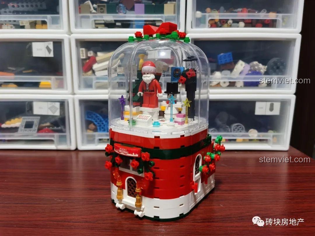 Mô hình Hộp nhạc Giáng Sinh Merry Christmas Zhe Gao QL0981 hoàn chỉnh, với các chi tiết trang trí và cơ chế hộp nhạc.