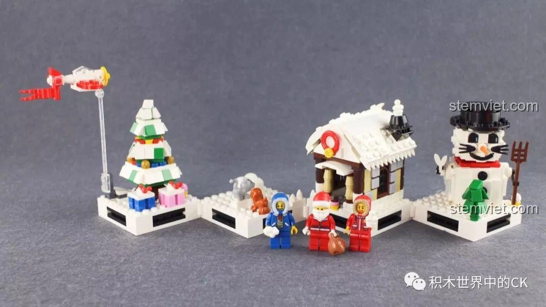 Toàn cảnh mô hình bộ lắp ráp Winner 5034 Giáng Sinh Trắng 4 trong 1 với các minifigure và cảnh quan tuyết.