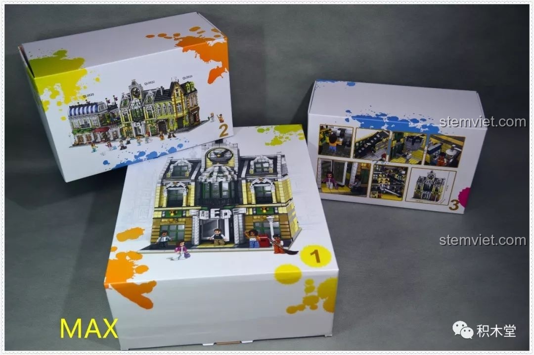 Cận cảnh ba hộp nhỏ chứa mảnh ghép của bộ đồ chơi xây dựng Zhe Gao QL0922.