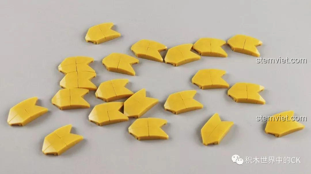 Các mảnh ghép tạo hình vảy rồng màu vàng óng của bộ SEMBO 605102, chi tiết tinh xảo.