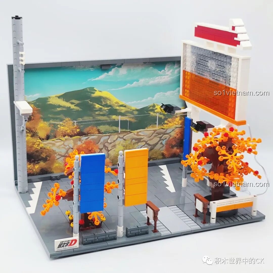 Cảnh quan đường phố với cây và biển báo của bộ CaDA C61034 Nakayama-dō 峠の釜めし