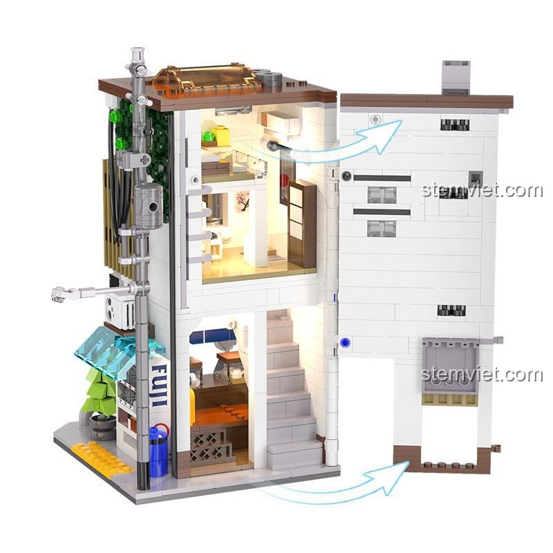 Cận cảnh mặt bên của bộ lắp ghép CaDA C66006 Nhà Bánh Bao Nhật Bản, thể hiện chi tiết kiến trúc và đường ống, đồ chơi mô hình chất lượng cao.