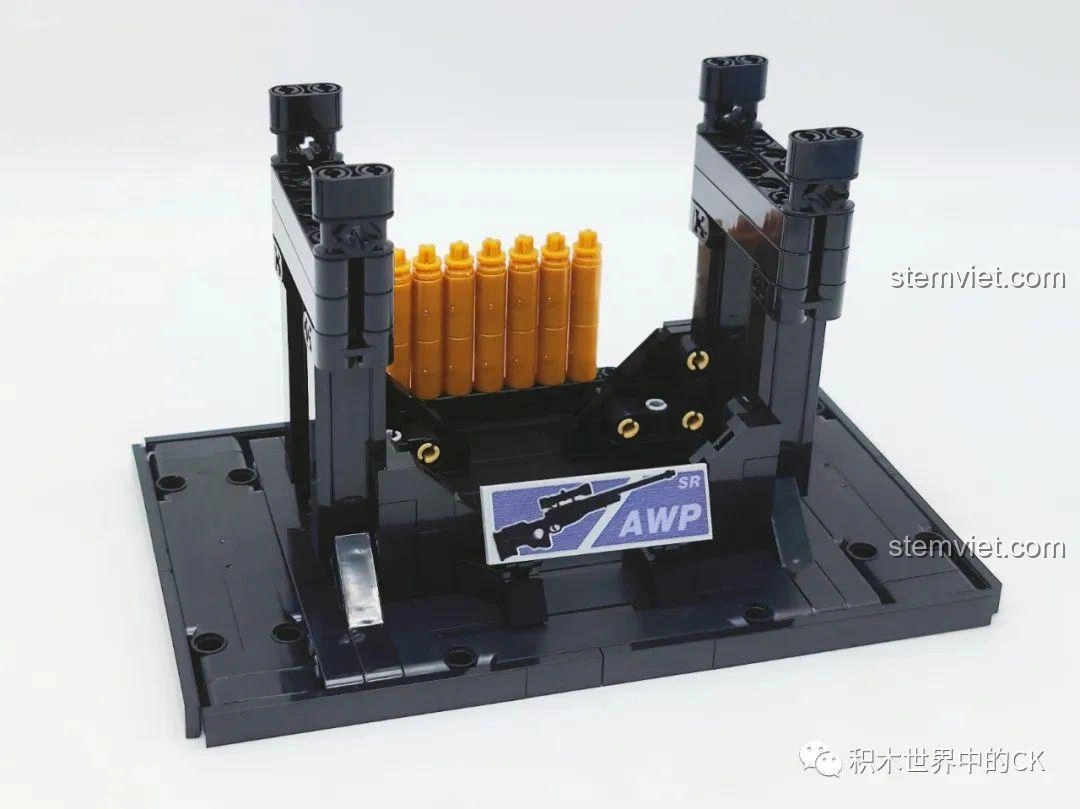 Giai đoạn đầu lắp ráp bộ lắp ráp Mô hình súng AWP 22, tạo chân đế và các viên đạn màu vàng.