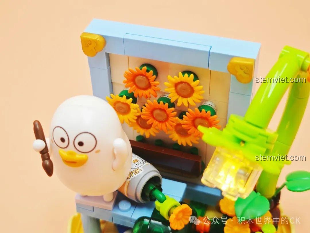 Cận cảnh chi tiết tuýp màu, hoa hướng dương và đèn LED phát sáng trong bộ SEMBO 612024. Cảm nhận SEMBO 612024.