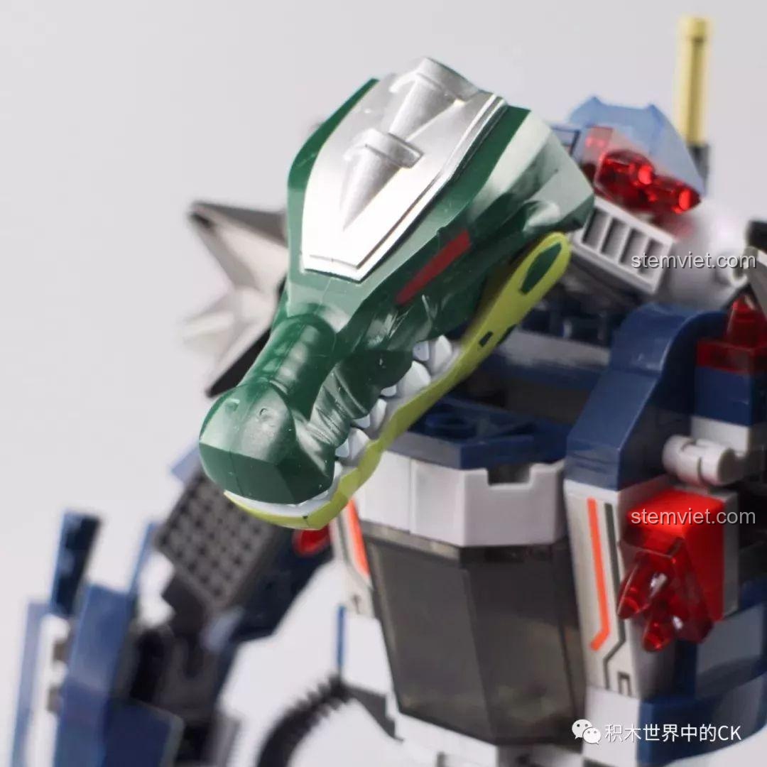 Cận cảnh phần đầu cá sấu của Robot Mecha, chi tiết tạo hình rất ấn tượng và mạnh mẽ.