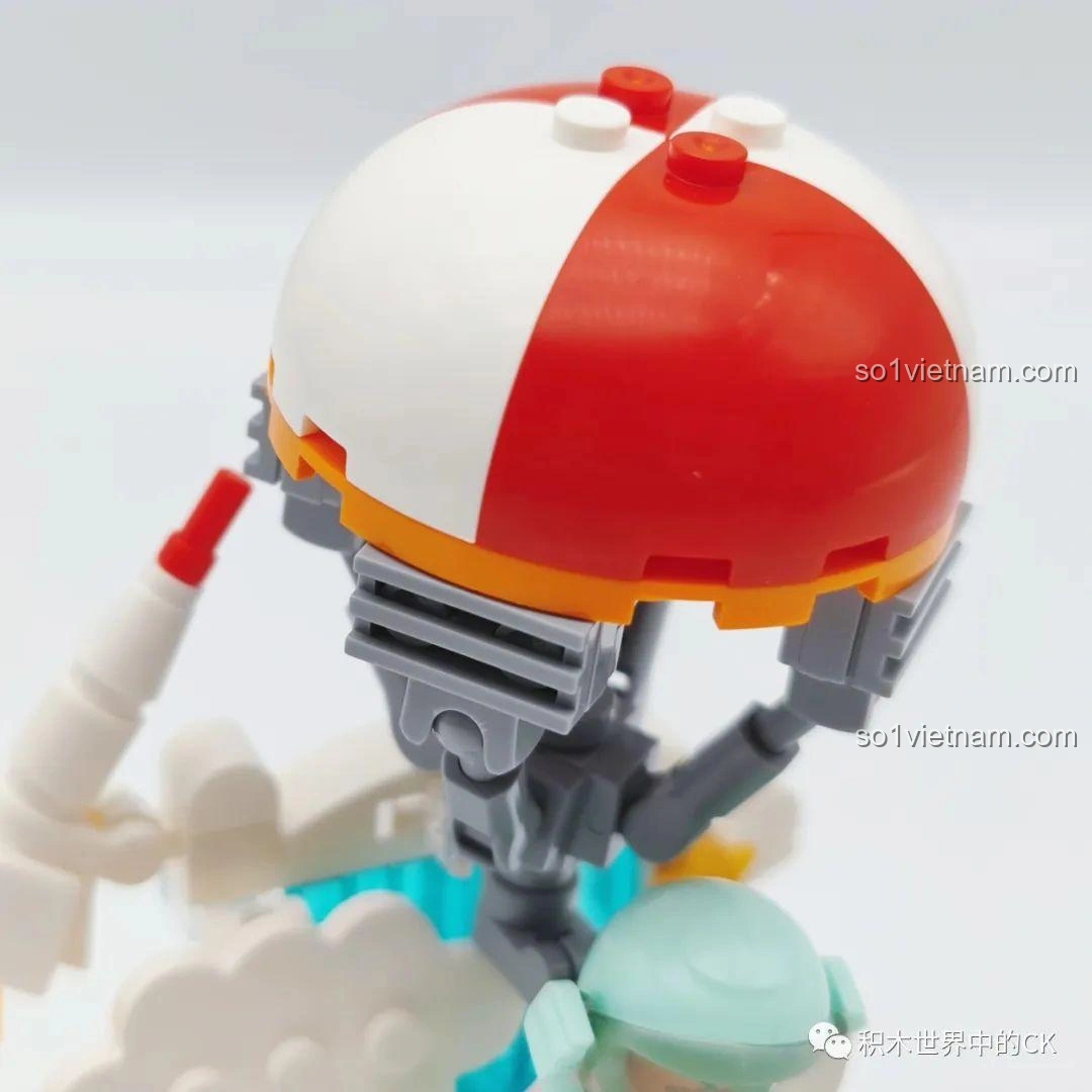 Cận cảnh chiếc dù đỏ trắng và các chi tiết đỡ, một phần của mô hình Space Landing trong bộ đồ chơi WISE BLOCK HA390213.