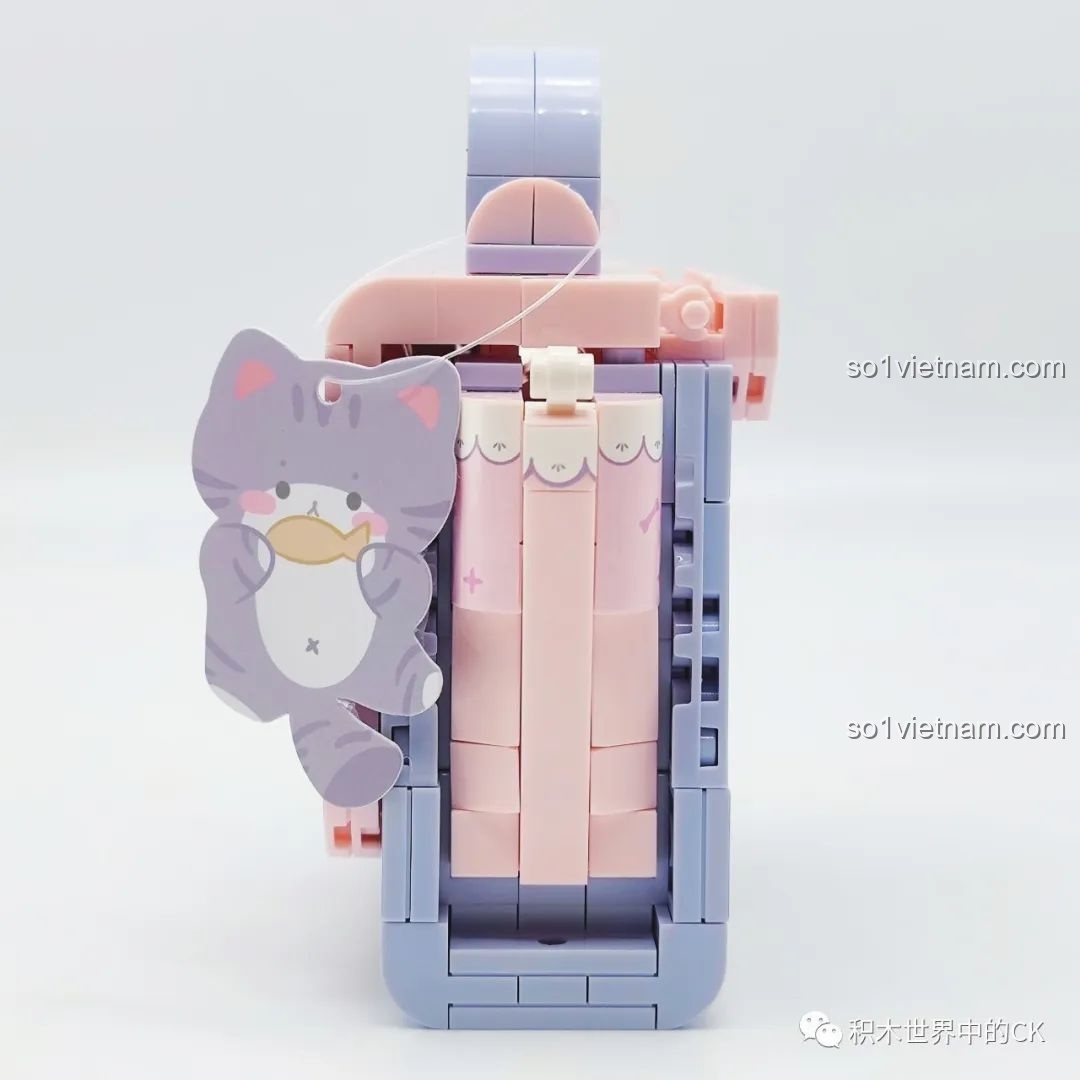 Góc nhìn bên hông của túi xách lắp ráp Wekki 516908, thể hiện cấu trúc các mảnh ghép và sự kết hợp màu sắc.