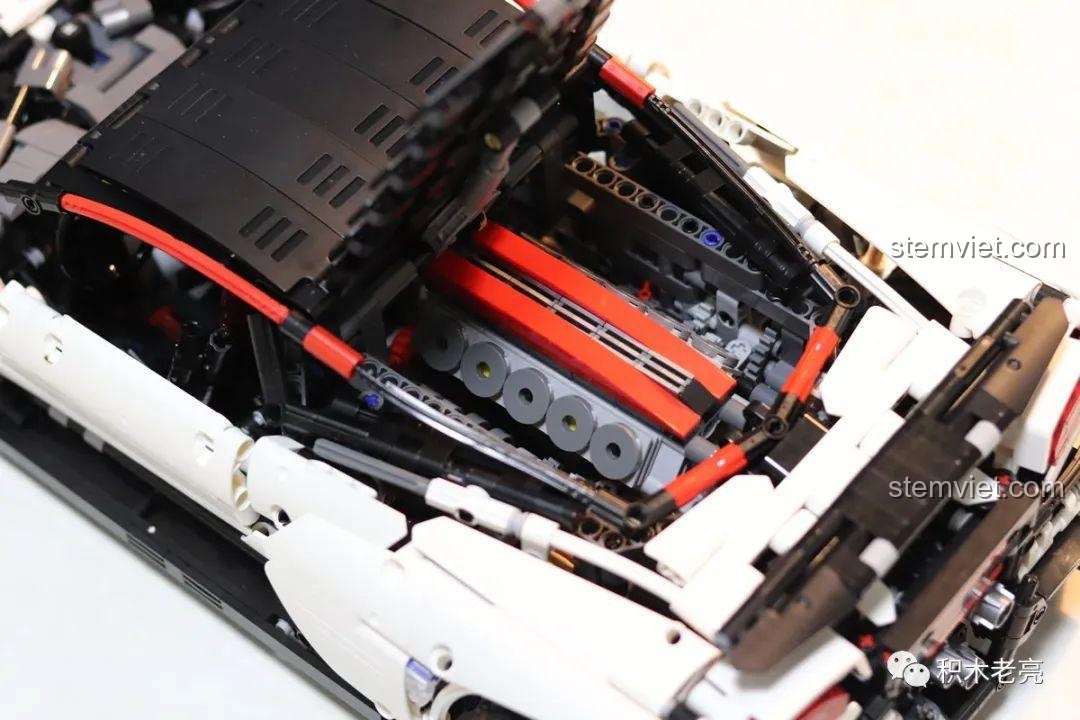 Sơ đồ lắp ráp 3D tổng thể của xe Ultimatum GTR V10 ở bước 156, trang 229, cho thấy toàn bộ cấu trúc bên trong.