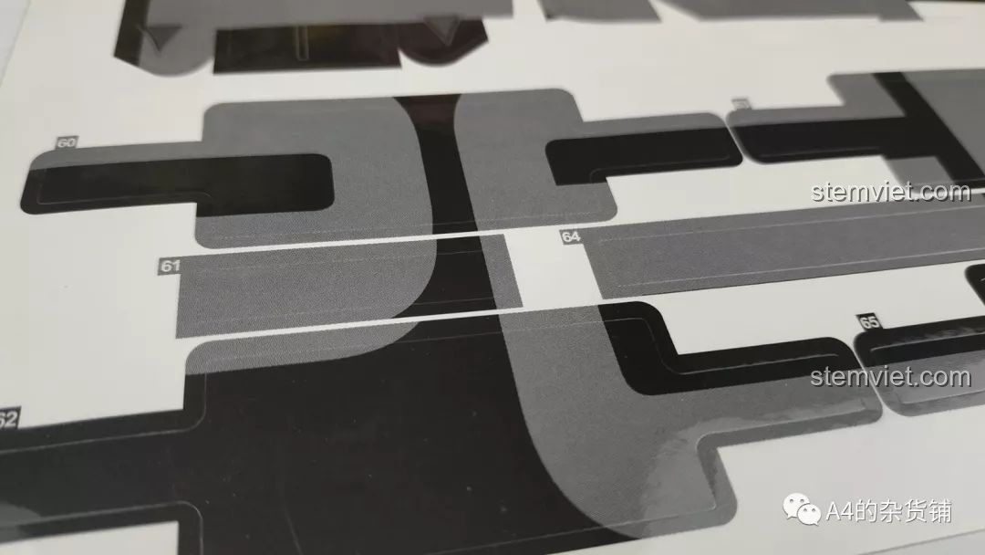 Cận cảnh chi tiết các miếng dán trong bộ decal của CaDA C61016, chất liệu giống giấy.