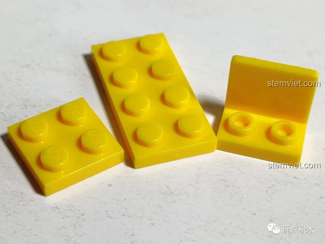 Cận cảnh chất lượng mảnh ghép màu vàng của bộ Sluban B0761, bề mặt nhẵn bóng và các khớp nối chắc chắn.