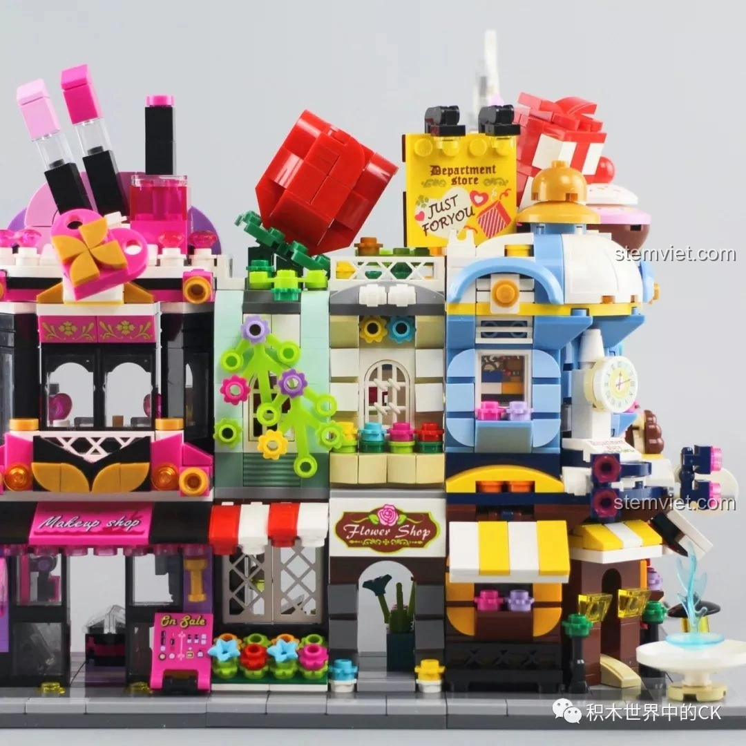 Cận cảnh chi tiết các cửa hàng trong dãy phố đồ chơi lắp ráp Keepplay City Corner C0101-C0105, thể hiện sự phong phú.