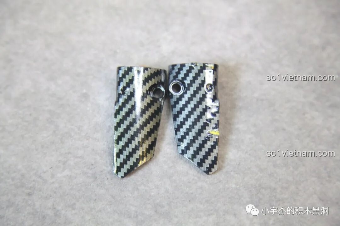 Cận cảnh hai chi tiết ốp đầu xe được in vân carbon sắc nét, một điểm nhấn đắt giá của bộ ZHEGAO QJ5183 Kawasaki Ninja H2R.