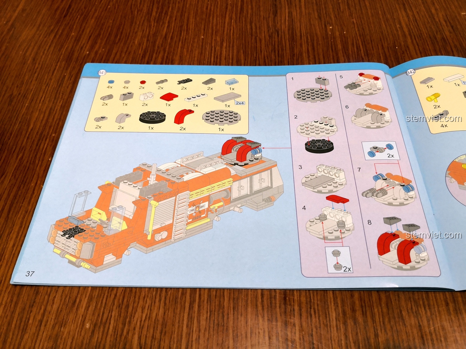 Một trang trong sách hướng dẫn QMAN 2809 cho thấy các bước lắp ráp được trình bày trực quan.