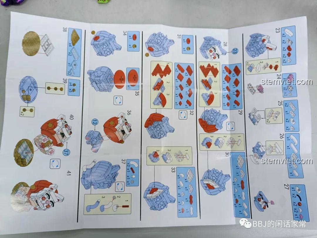 Các bước hoàn thiện mô hình Mèo Thần Tài Xiao Meng Ji 2053 trong tờ hướng dẫn, cho thấy sự phức tạp vừa phải.