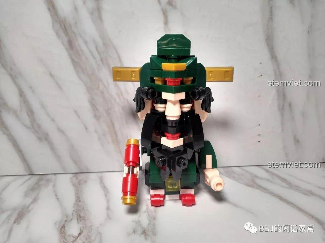 Các chi tiết của mô hình Lộc Tinh ZHEGAO QL0953-2 bị tháo rời, minh họa vấn đề về độ khít và dễ rơi của các mảnh ghép.