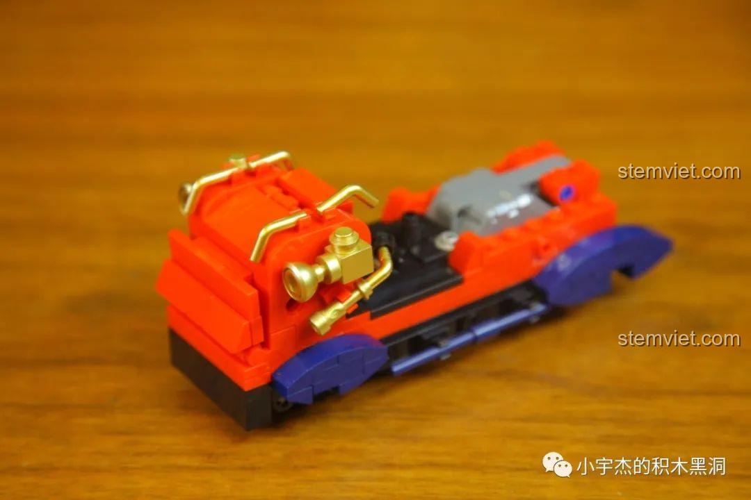 Gắn các chi tiết mạ vàng sang trọng lên phần đầu xe của mô hình SEMBO 705400 Xe Duryea Runabout L.