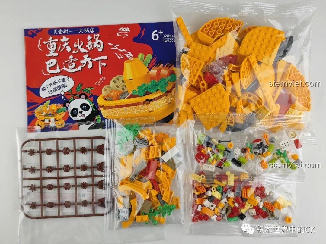 Các túi mảnh ghép của bộ lắp ghép Nồi Lẩu Zhe Gao CW6006, với tông màu vàng cam ấm áp, nhiều chi tiết.