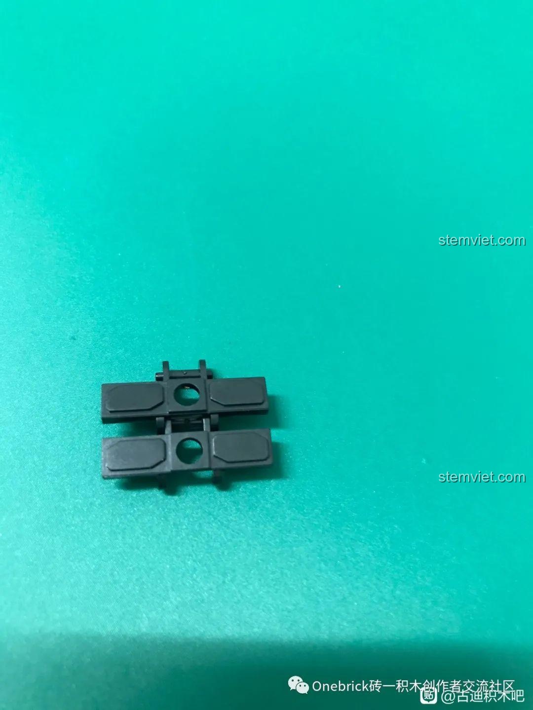 Cận cảnh một mắt xích của bộ lắp ráp GUDI 6104, một chi tiết đặc biệt tạo nên dải xích.