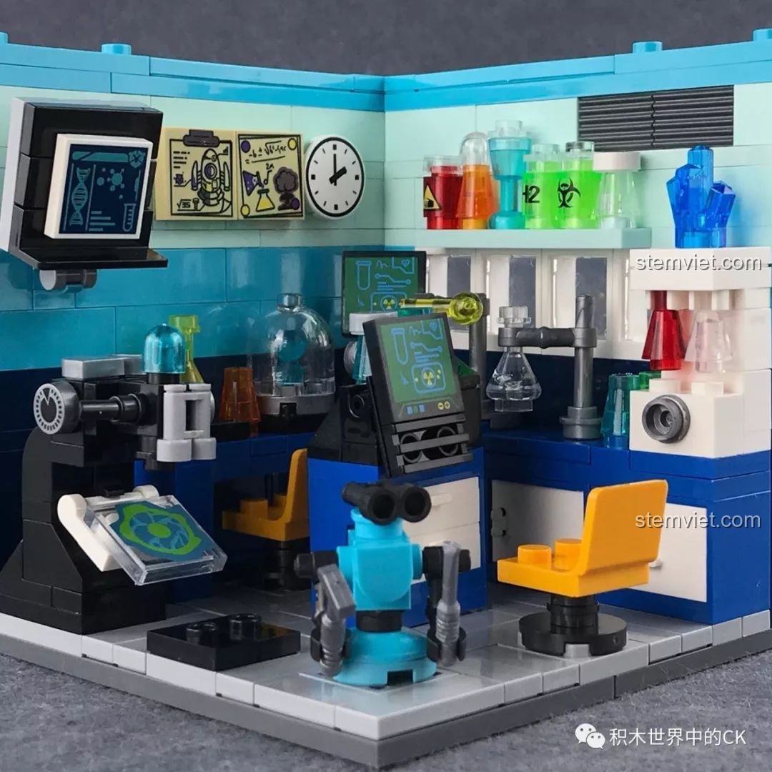 Cận cảnh các chi tiết trong phòng thí nghiệm như màn hình, bảng vẽ, đồng hồ và robot phụ tá.