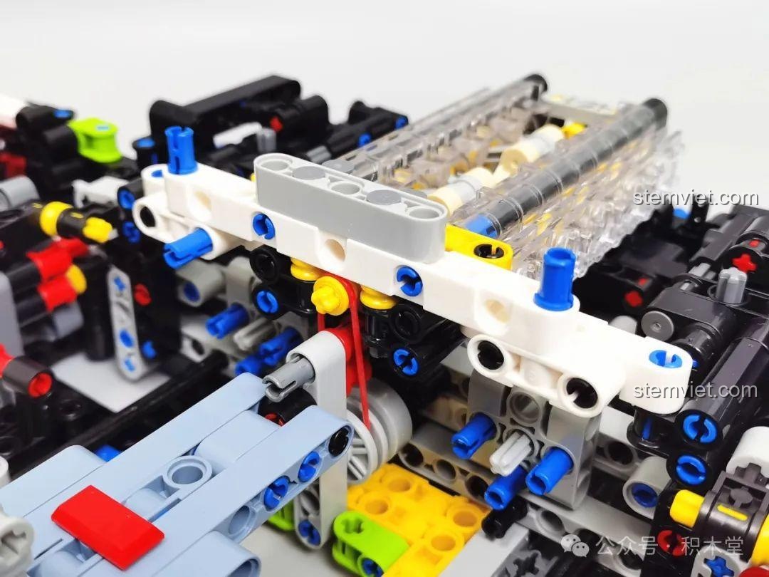 Cơ cấu truyền động bằng dây curoa của động cơ trong bộ lắp ráp Xe đua AI Asurada L7001 xịn giá rẻ.