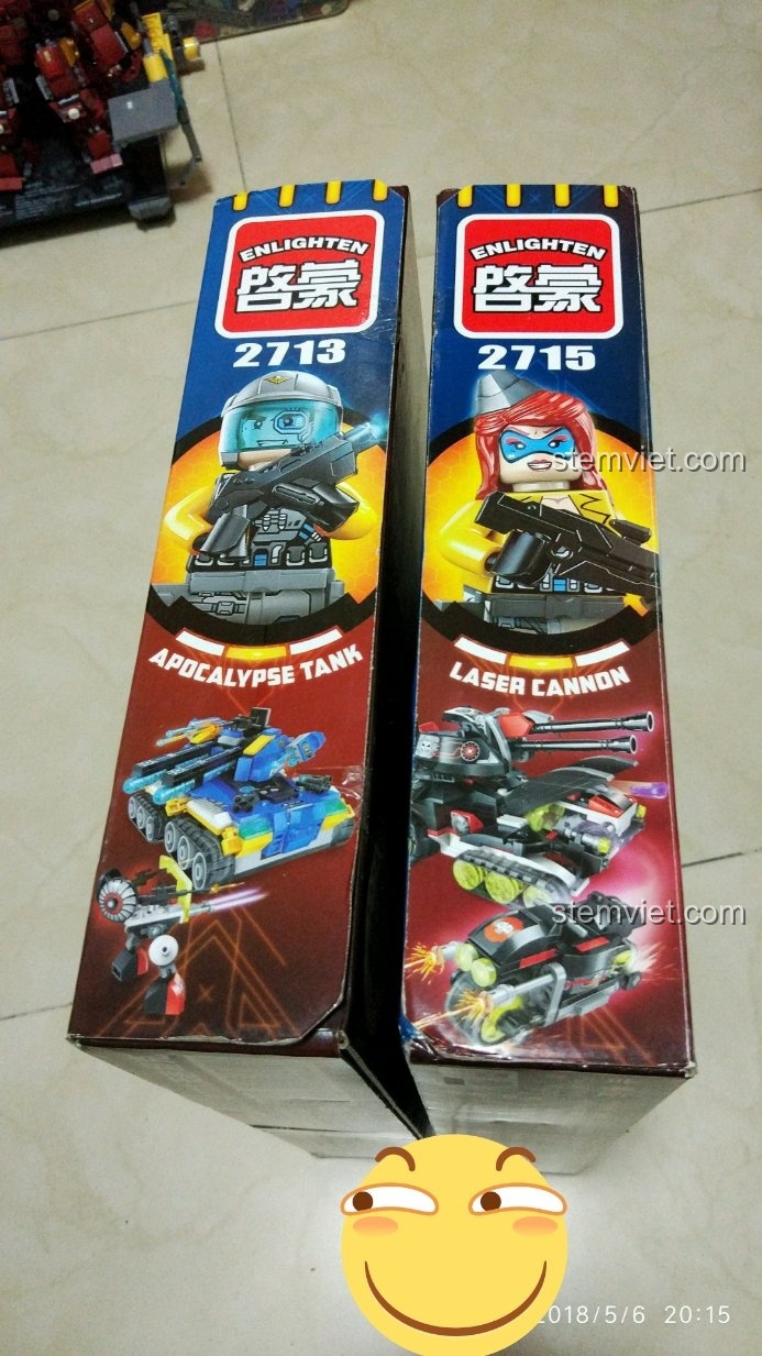 Cận cảnh hai hộp đồ chơi lắp ráp QMAN 2713 Apocalypse Tank và 2715 Laser Cannon thuộc series Kỷ Nguyên Công Nghệ Cao.