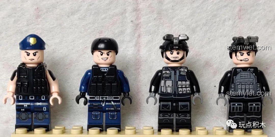 Bốn minifigure đầu tiên trong bộ Tàu Tuần Tra Hắc Ưng SEMBO, gồm các thành viên đội SWAT.