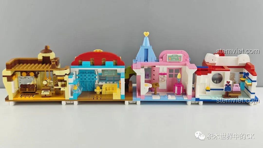 Nội thất bên trong mô hình Trạm Xe Buýt Thời Trang Hello Kitty Keeppley K20807, với hình ảnh Hello Kitty và hộp thư.