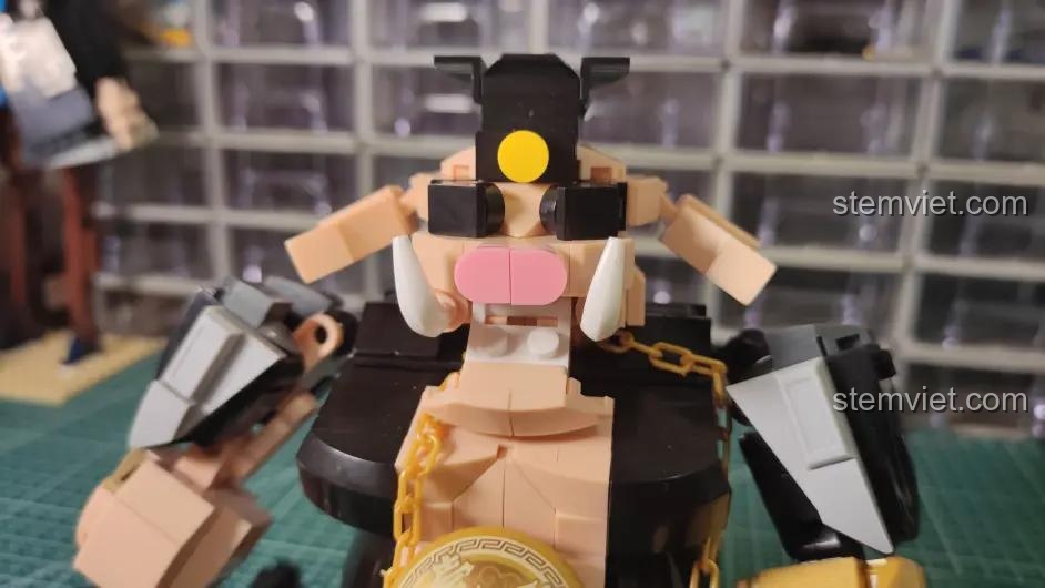 Mô hình Trư Bát Giới Phong Cách Hiện Đại Sluban M38-B1009 với đầu xoay và khả năng ngẩng lên, cúi xuống linh hoạt.