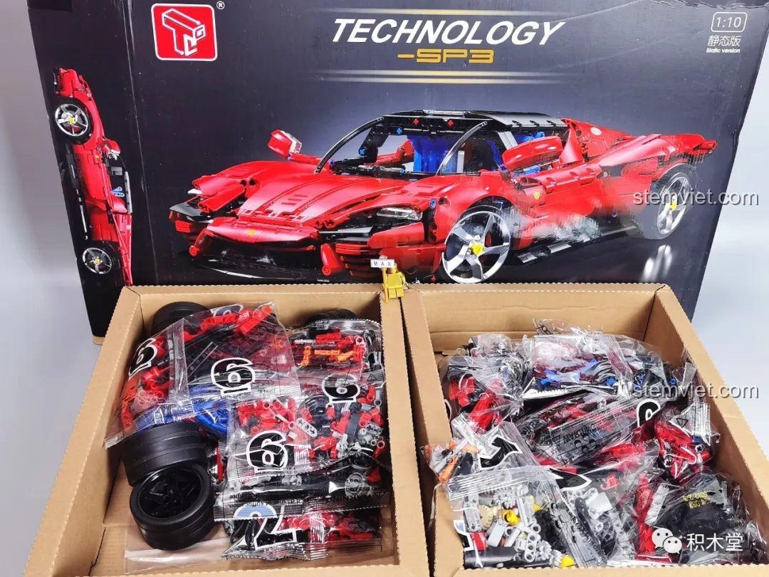 Nội dung bên trong hộp bộ lắp ráp Taigaole T5032, với các túi linh kiện được phân chia trong hai khay riêng biệt.