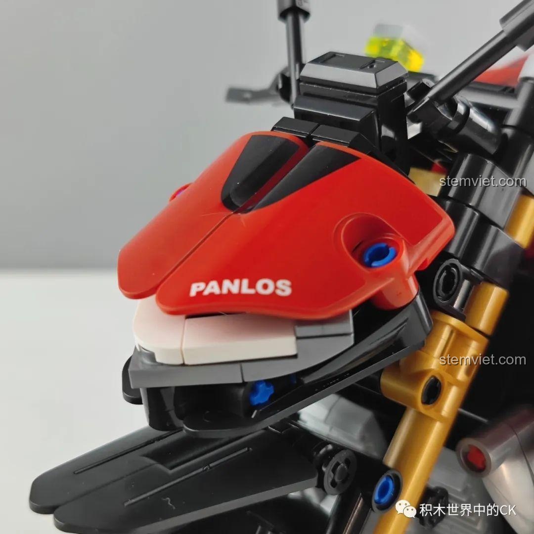 Đầu đèn của bộ lắp ráp Chiến mã tốc độ Streetfighter V4 SP cho trẻ em 14+, thiết kế sắc sảo.