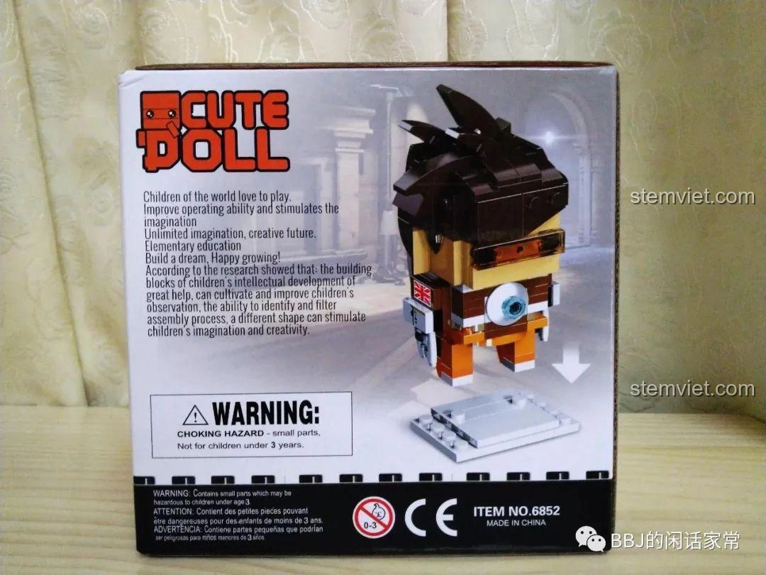 Mặt bên hộp bộ lắp ghép Decool 6852 Tracer Overwatch, với các cảnh báo an toàn và thông tin giáo dục về đồ chơi.