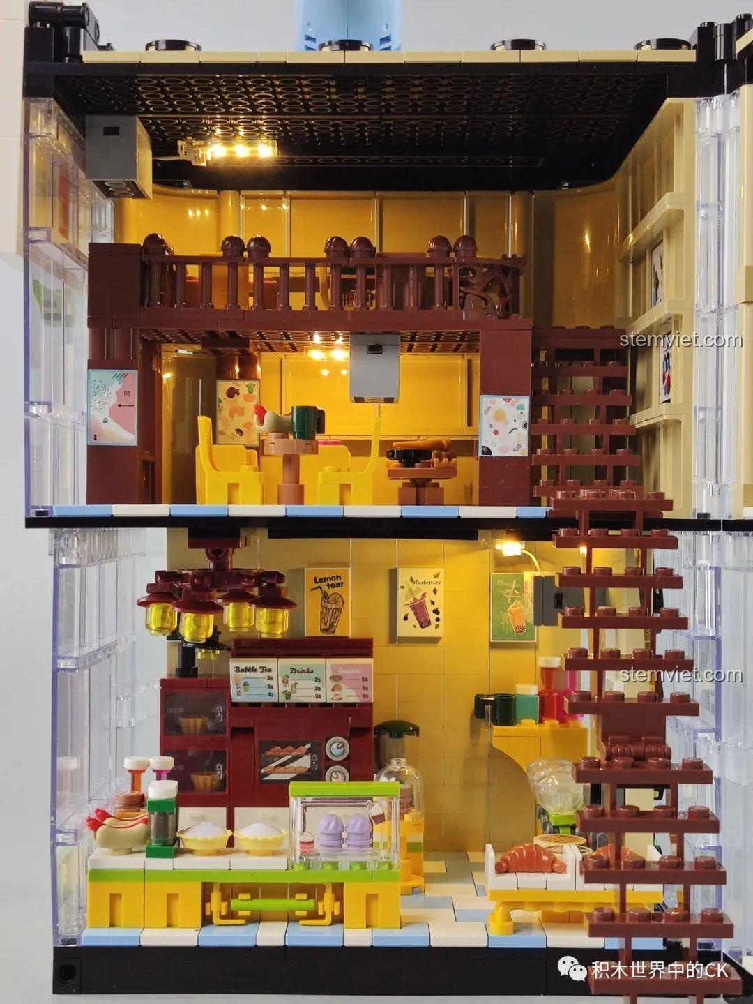 Mô hình Cửa hàng trà sữa JIAZHI SY 5209 với hiệu ứng đèn LED sáng rực, tạo không gian ấm áp.