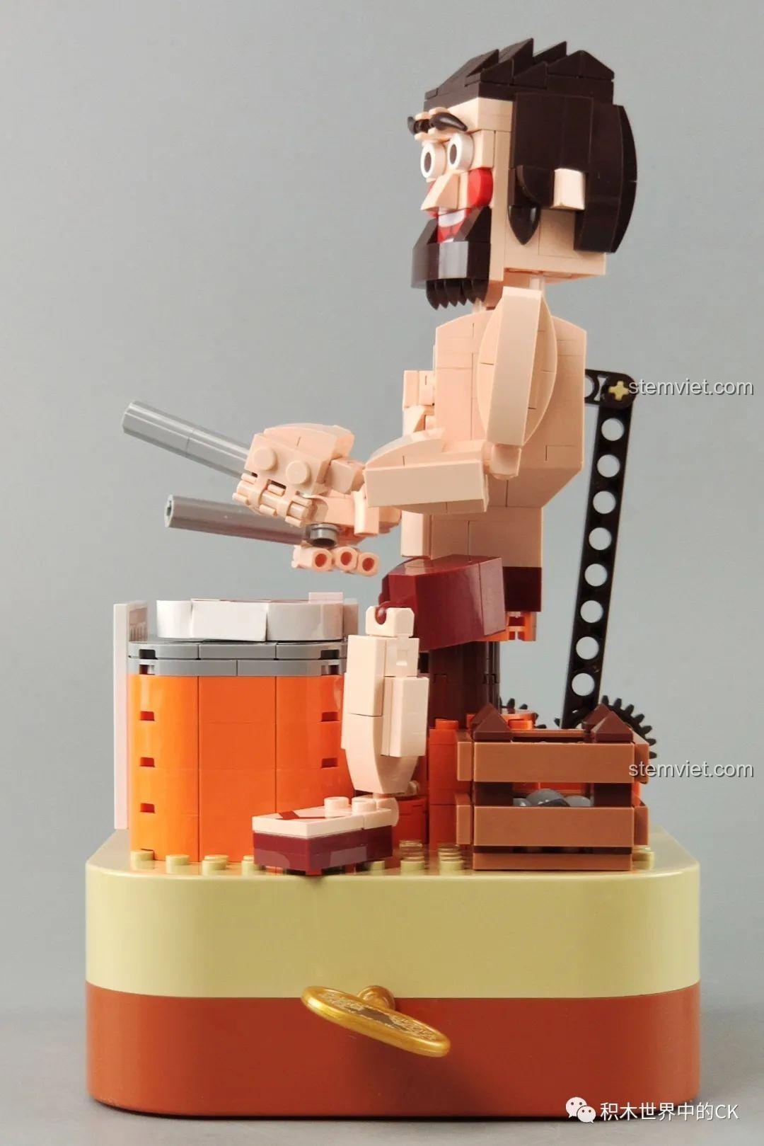 Mô hình Hộp nhạc thịt bò viên JAKI JK1801 nhìn từ góc nghiêng, thể hiện cấu trúc và các chi tiết chuyển động.