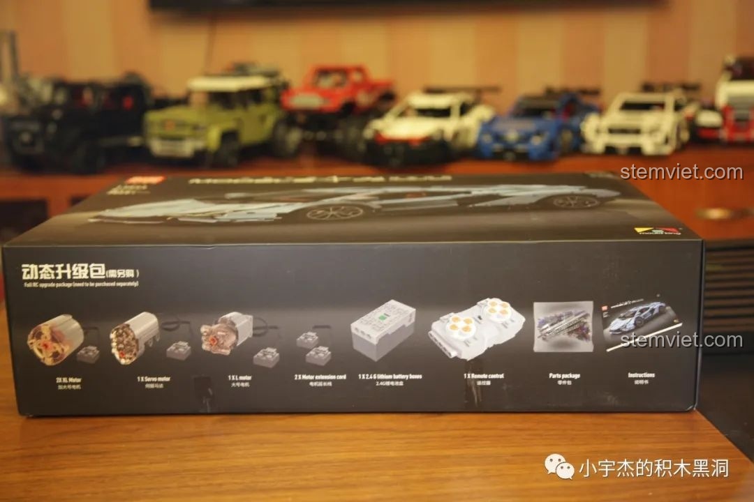 Mặt bên hộp đồ chơi lắp ráp Mould King 13056 Lamborghini Hyper, liệt kê các thành phần Power Functions như động cơ, pin, điều khiển.