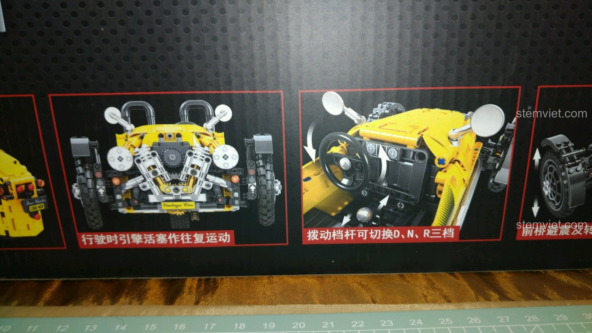 Hộp đồ chơi mô hình Xe Đua Cổ Điển Ba Bánh Winner, thể hiện động cơ và vô lăng có thể điều khiển.