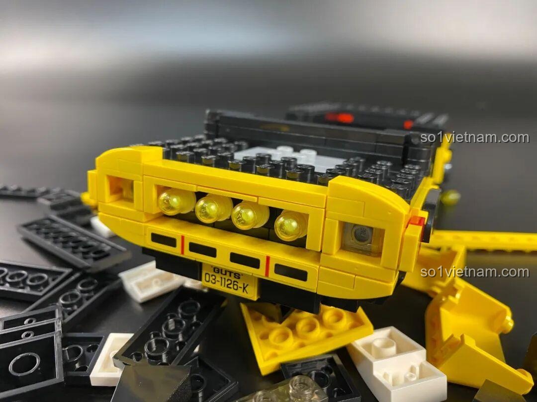 Pháo trên nóc xe tuần tra Delam Patrol Car Enlighten 75039 có thể mở ra và bắn đạn, mang lại trải nghiệm chơi hành động.