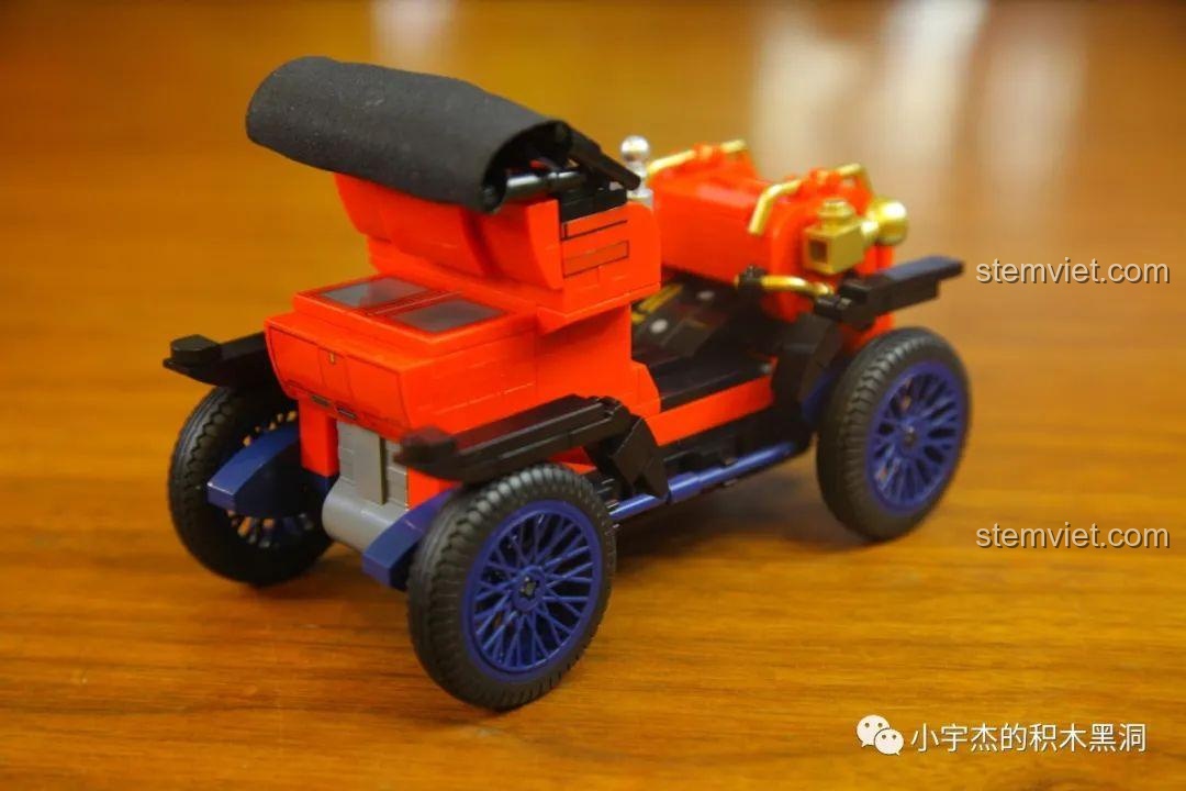 Mô hình xe Duryea Model L SEMBO 705400 nhìn từ phía sau, nổi bật với mui xe bằng vải canvas màu đen.