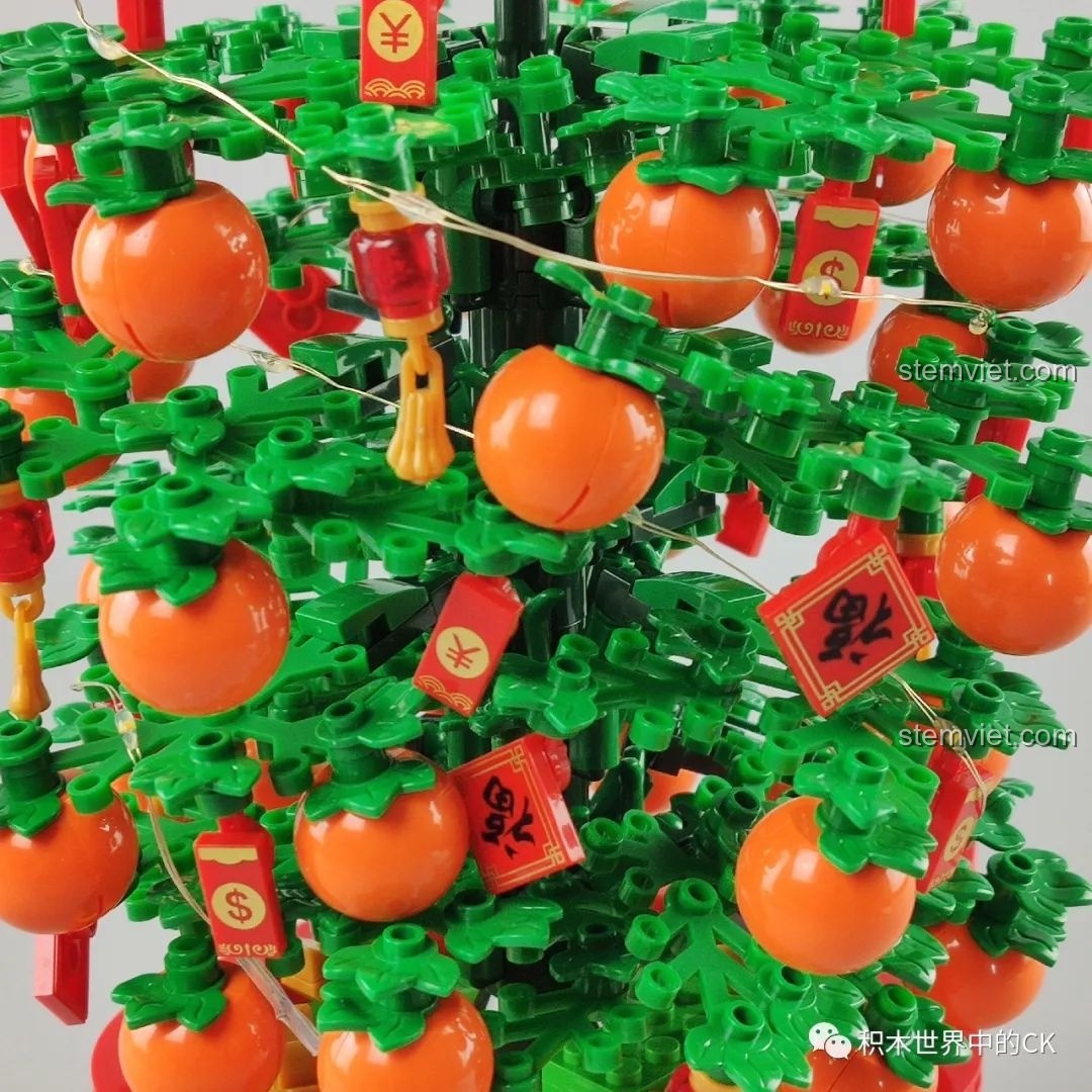 Góc nhìn từ trên xuống của mô hình cây quất SEMBO 601145, thể hiện sự sắp xếp hài hòa. Trải nghiệm SEMBO 601145 Cây quất may mắn.