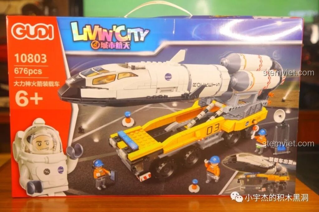 Mặt trước hộp đồ chơi GUDI 10803 Xe Tải Chở Tên Lửa Hercules, thể hiện mô hình hoàn chỉnh và 4 minifigures.